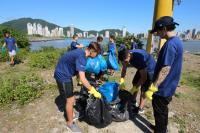 Juntos Pelo Rio mobiliza mais de mil voluntrios para limpeza do rio, molhes, praia do Atalaia e avenida Beira-Rio